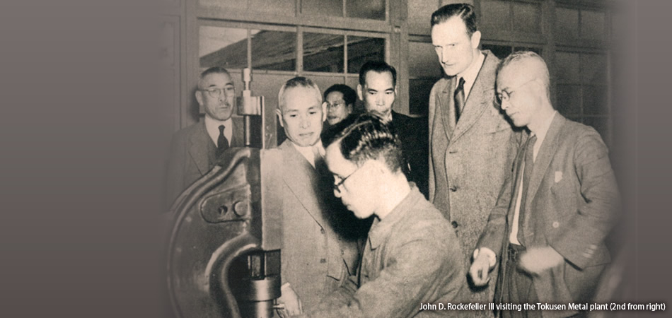John D. Rockefeller III visiting the Tokusen Metal plant (2nd from right) 